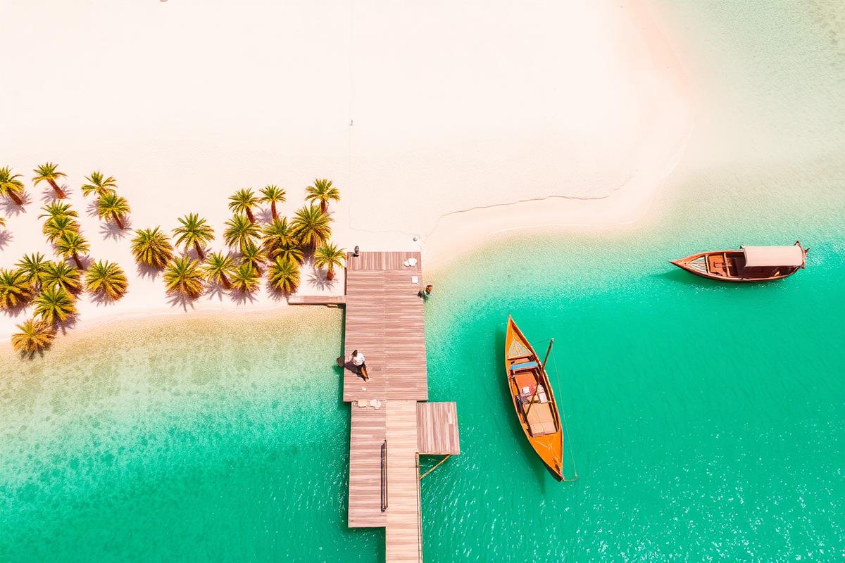 Red Sea beach with dhow boats